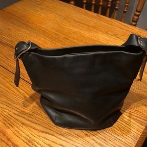 Black leather coach purse.